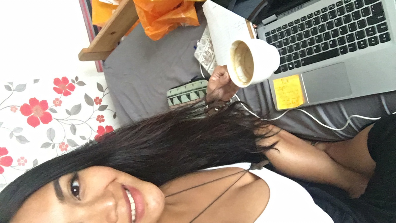 LuLu working with laptop and coffee