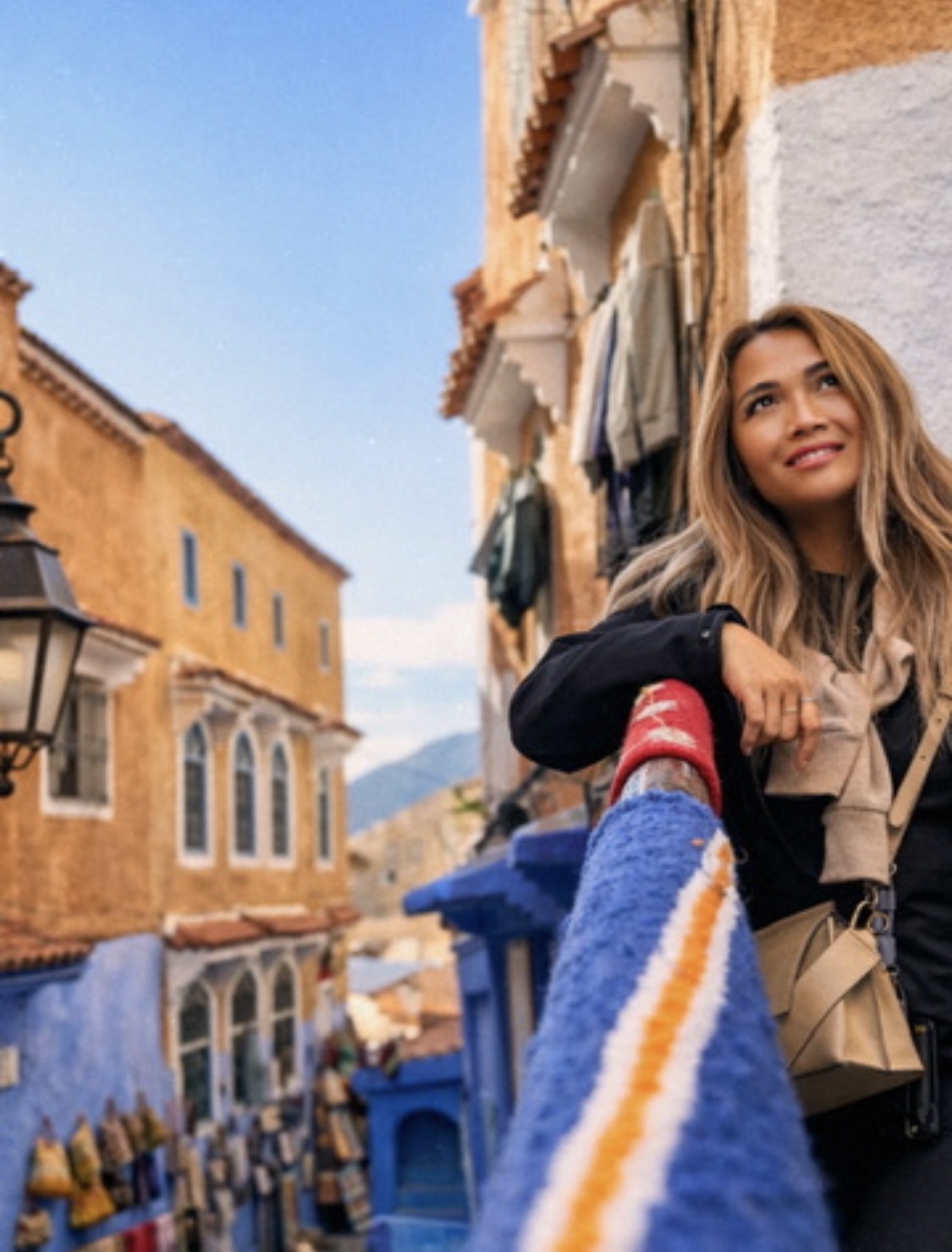 LuLu travelling in a colourful town